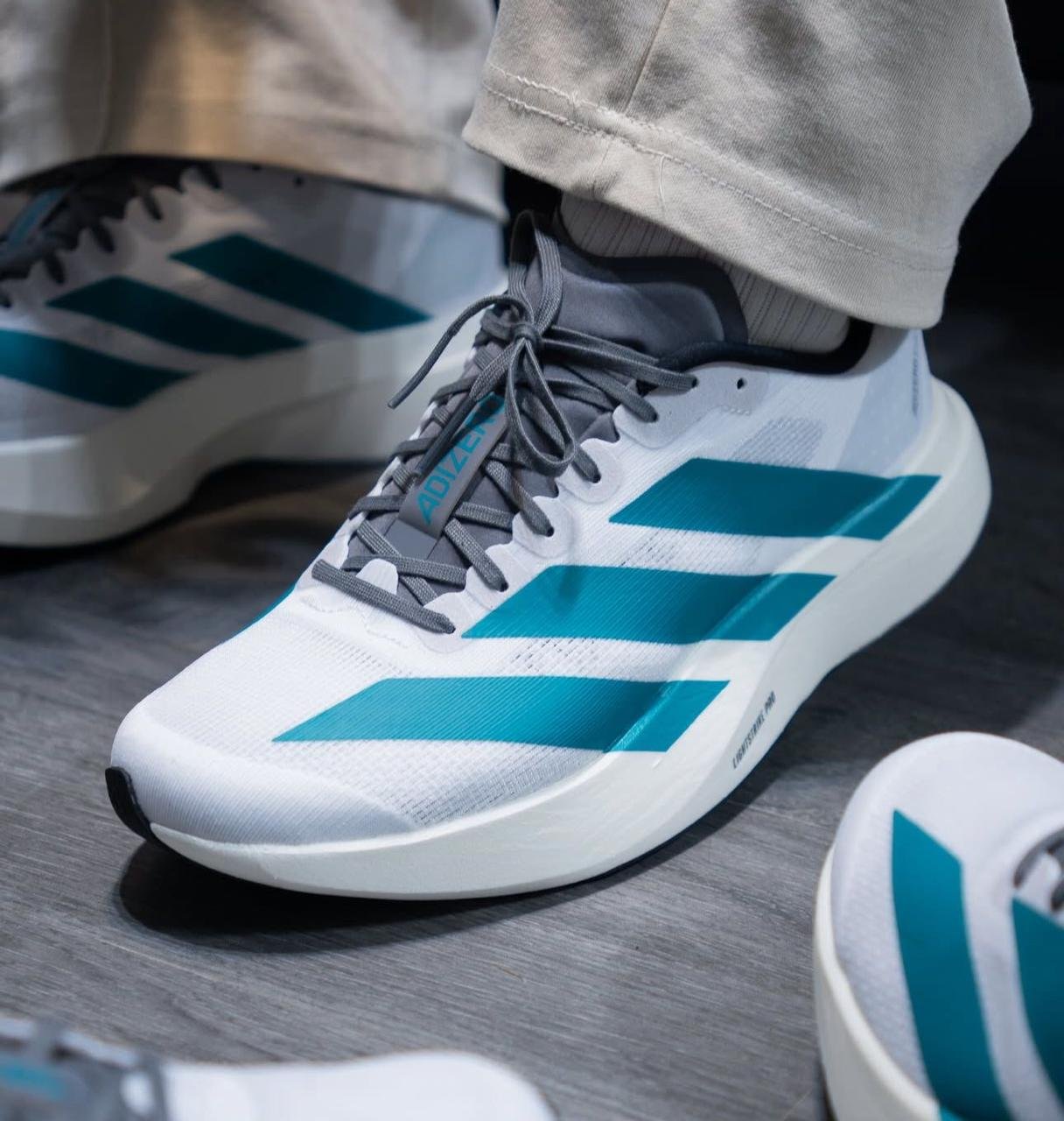 Adidas Adizero EVO White with Aqua Blue Stripes – Lightweight Racer