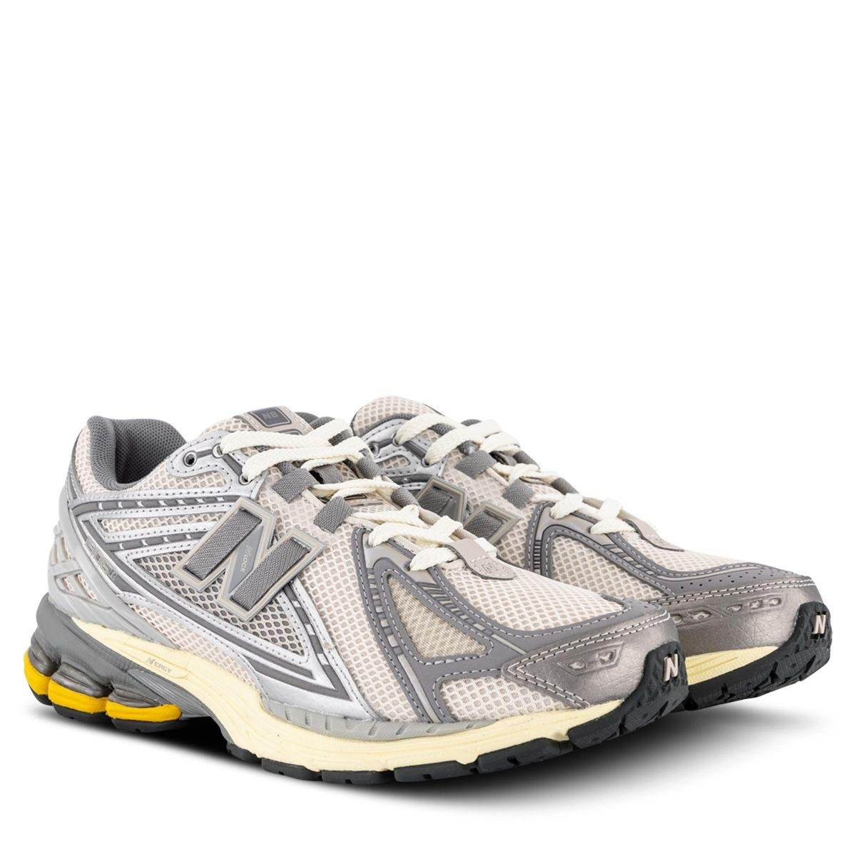 New Balance 1906U Beige Grey Sneakers with Yellow Sole Accent