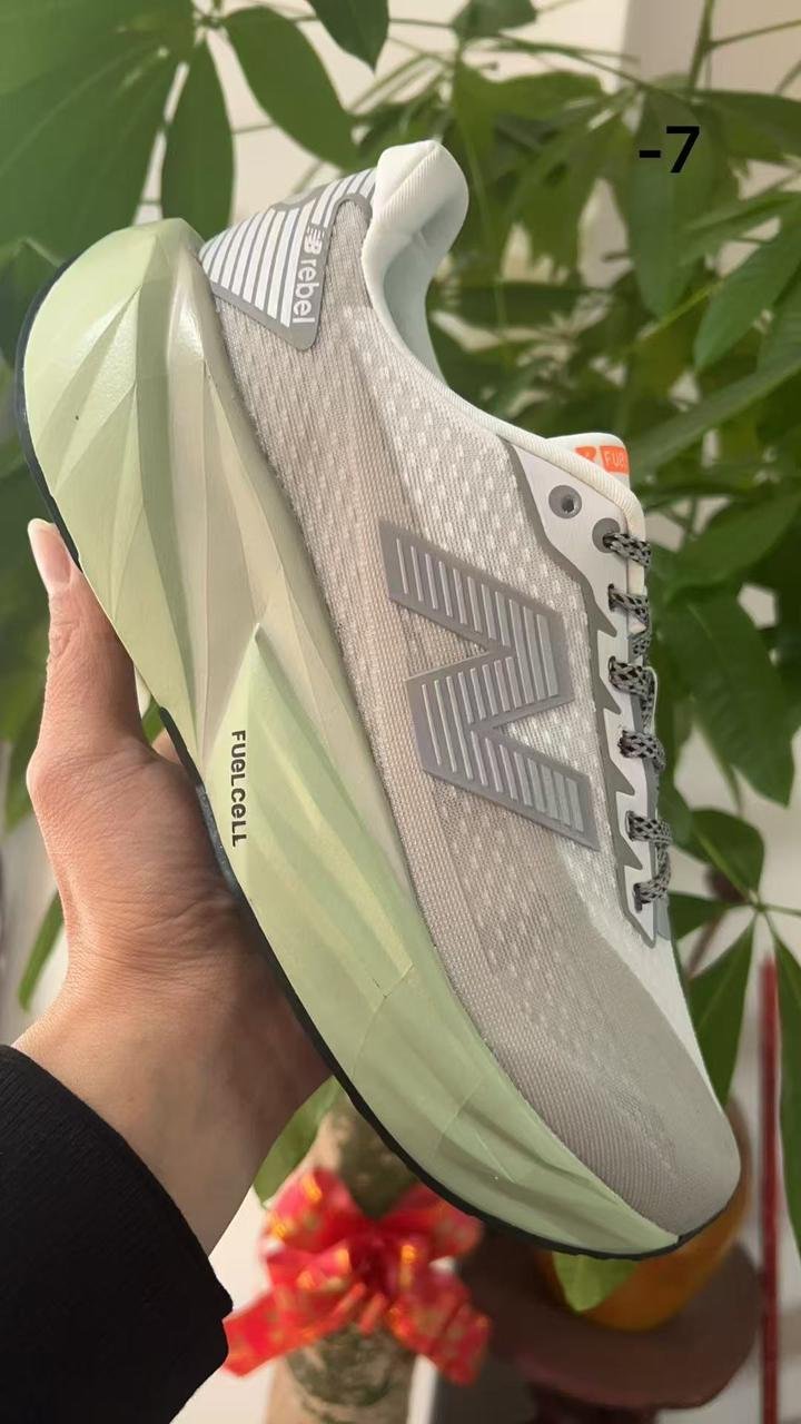 New Balance Rebel Off White Grey Running Sneakers