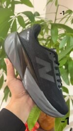 New Balance Rebel Triple Black Running Sneakers