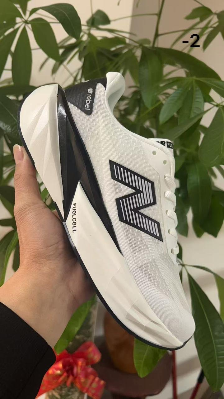 New Balance Rebel White Black Running Sneakers