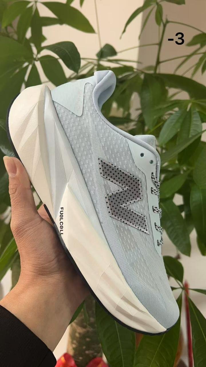 New Balance Rebel White Grey Running Sneakers