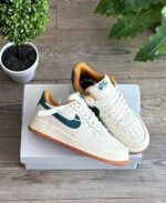 Air Force 1 Sneakers – White with Orange Swoosh