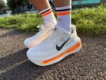 White & Orange Air Cushion Running Shoes with Black Swoosh – Vomero Premium